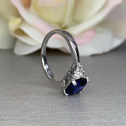 Asscher cut blue sapphire engagement ring, with Moissanite round accents, 2.00ctw 14k white gold